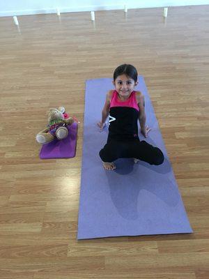 One of our little yogini's practicing next to her little friends in Kids on the Mat. Every Wednesday and Sunday!