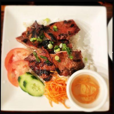 Pork chops served with jasmine rice