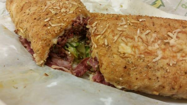 Toasted pastrami sandwich.