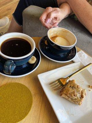 Top notch Americano, oat milk latte & signature scratch made butterscotch & pecan scone.