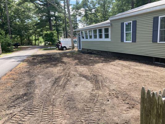 Driveway renewal, land grading and new installation.