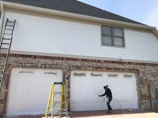 Spraying the garage doors. Came out so nice.