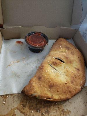 Calzone. Mushroom, spinach, black olives