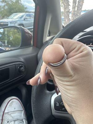 You can see here the nail isn't connected to the acrylic at all.