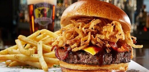 Barbecue bacon cheese burger with onion straws