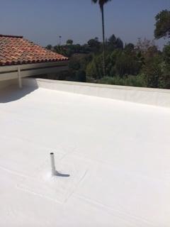 White solar reflective elastomeric roof upgrade coating