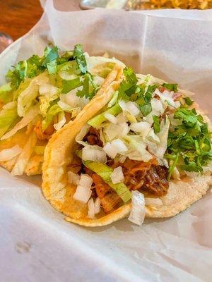 Chicken and carnitas tacos