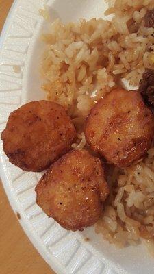 These are the burned scallops they serve on top of the flavorless rice and beside the tough, overcooked trash meat they call Filet Mignon.