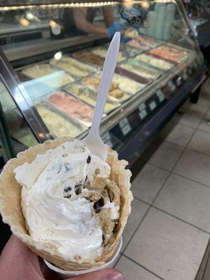 Cake batter ice cream with a cookie dough mix-in, in a waffle cone- yum!