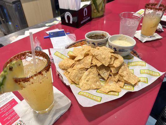 Oaxaca queso dip with tomatillo salsa and cocktails