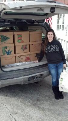 Our kid's made 400 Food Boxes for those in need...parents help deliver them!