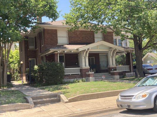 The side entrance to the church for handicap accessibility is right behind the old parsonage, which is next-door to the church.