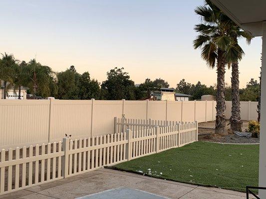 Tan vinyl fence