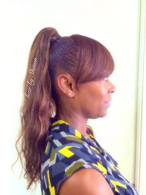 High ponytail with caramel highlights!