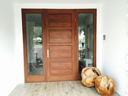 Titan Window and Door                            Impact Aluminum Door with Powder-coat Woodgrain Finish