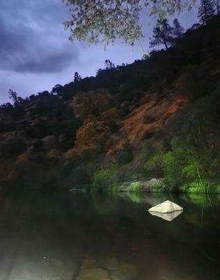 Relaxing by the river after sunset.