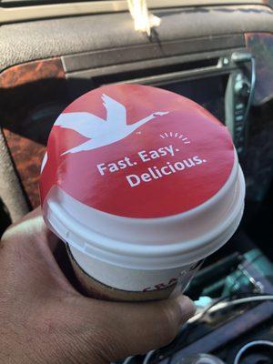 Paid on the app, it was ready but still hot when I got there and had a sticker over the holes on top of the cup.