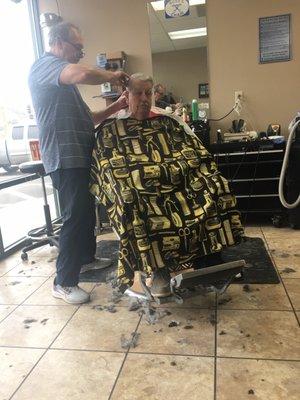 Barber at work on a Friday