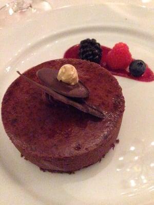 Chocolate hazelnut temptation with raspberry sauce and fresh berries.