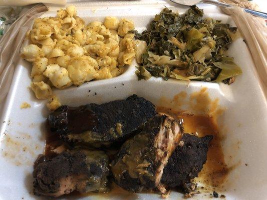 Smoked pork chops, peppery and cheesy Mac and packed full of flavor collards!