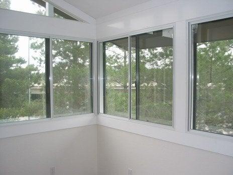 Adjoining wall - Two 2-panel sliders enclosed by two 2-panel Sound Proof Window Treatments sliders.