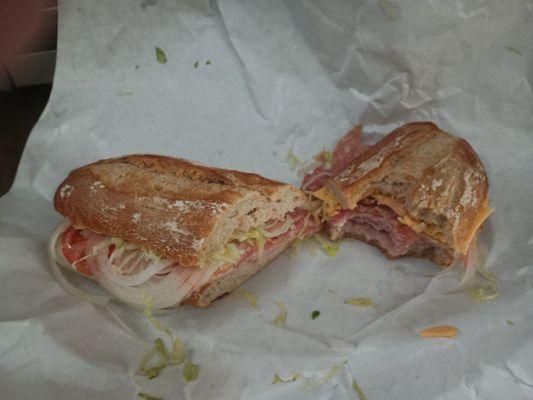 Italian sub for $12.95. No cheese I added the cheese at home. $2 more for cheese. Hmm no.