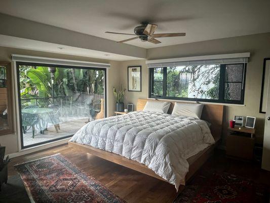 Two windows in bedroom