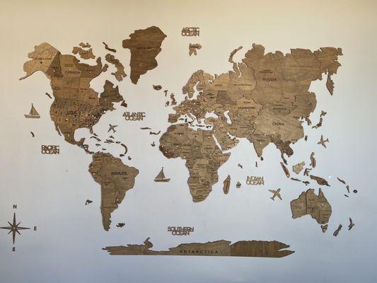 Map filled with pins of different countries/continents