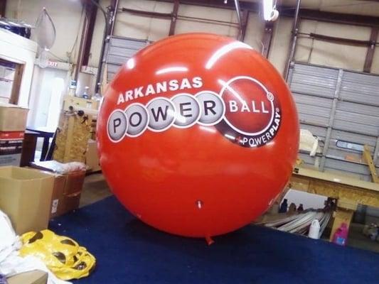 Giant balloons with logos. We sell and service giant helium balloons and cold-air advertising inflatables.