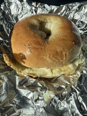 Sausage, egg and cheese on a plain bagel.