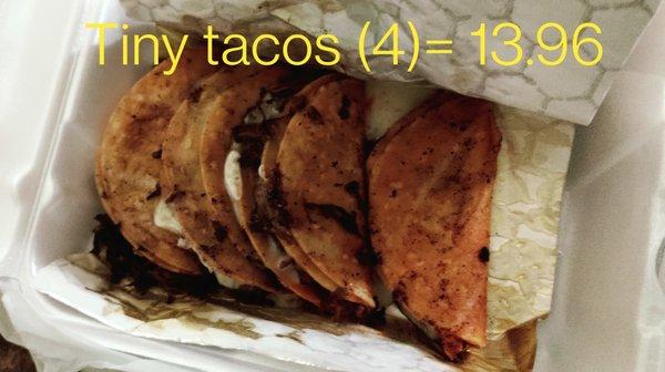 4 tiny tacos not worth 14.00$.