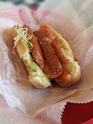 Grilled hot dog, but not the way they usually make it. I ask for tomato and lettuce. It's a great tasting dog.