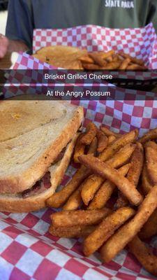 Brisket grilled cheese was pretty flavorless and greasy.  The seasoned fries were very tasty!