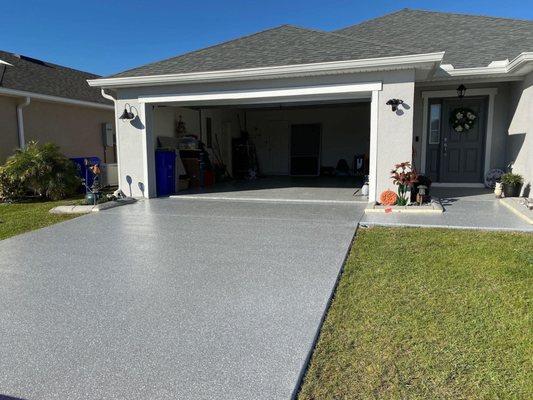 Polyaspartic Epoxy Driveway Flooring formulated, manufactured, and installed in-house! Receive a free quote today!