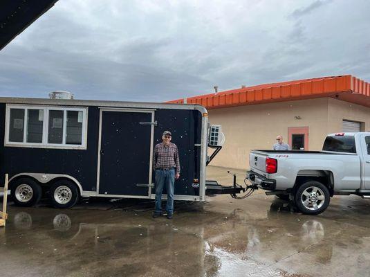 Happy customer picking up their custom built food trailer. Making dreams come true