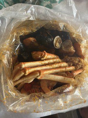 Deluxe Combo (1/2 Snow Crab, Shrimp, Black Mussels, Clam, Crawfish) add sausage