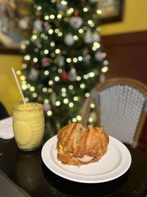 Breakfast sandwich (croissant & turkey) with The Gold Coast smoothie on the side