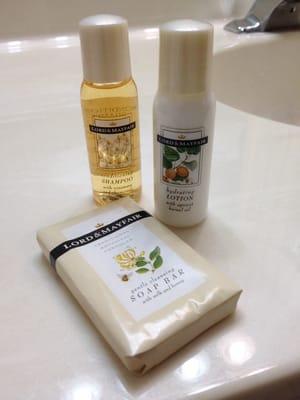 Lord & Mayfair toiletries in the bathroom, gentle cleansing soap bar, conditioning shampoo, and hydrating lotion.