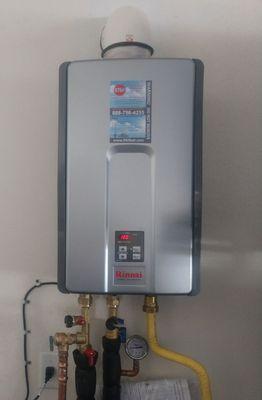 Tankless water heater installation. Save space, continuous hot water, lower utility bills, more control.