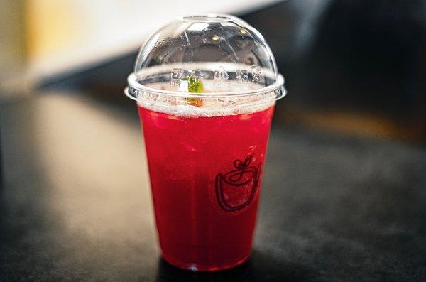 Hibiscus and strawberry puree? Yes! Hot Pink has both of these amazing flavors in one delightful sip!