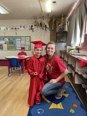 Peyton getting ready for graduation picture. Loving teachers & environment. Highly recommended