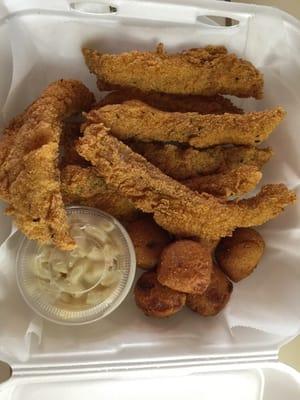 Dinner special: catfish ,seven pieces, with hush puppies and macaroni salad. Price $9.99