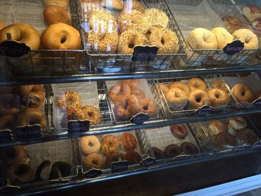 A fine selection of bagels, shelves are usually empty by noon