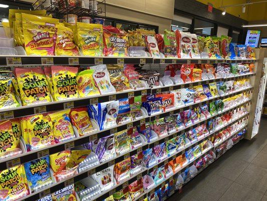 well-lit shelves display products. sharing size options are nice.