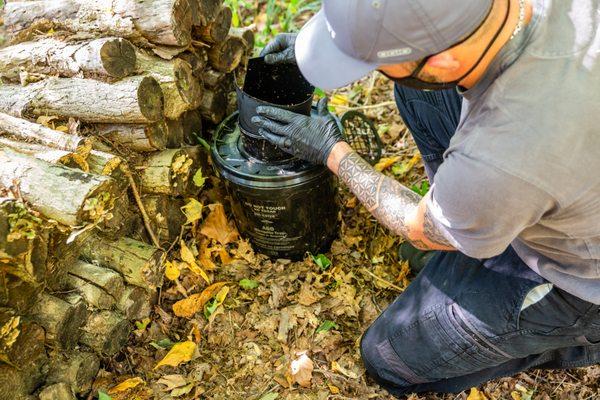 A mosquito trap being serviced as part of an insect program.