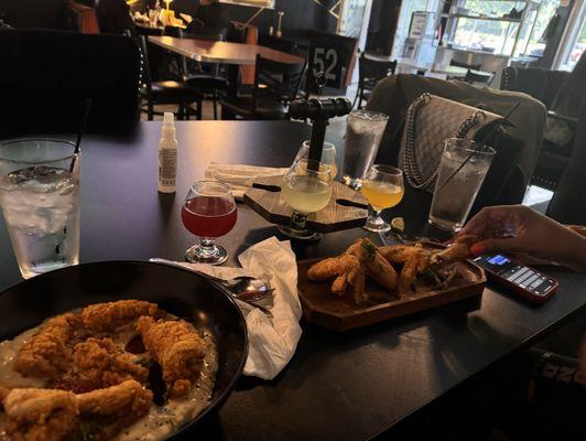 Catfish and grits, chicken wings, mimosas flights