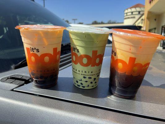 Two orders of Thai iced tea with boba and one order of matchata with boba.