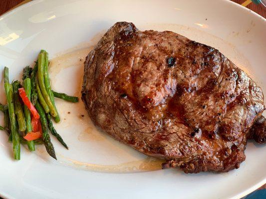 I always try the rib eye steak when staying at the Hilton by the airport.