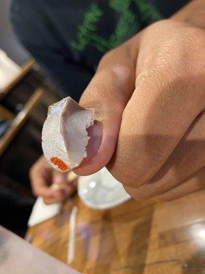 This is "1" piece of Mackerel Sashimi- used my fingernail for size comparison. It is the smallest piece of sashimi I have ever scene