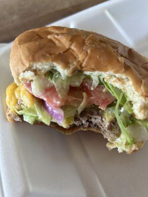 The most flavorful, juicy and cooked to perfection cheese burger, lettuce tomato and onion. So delicious!